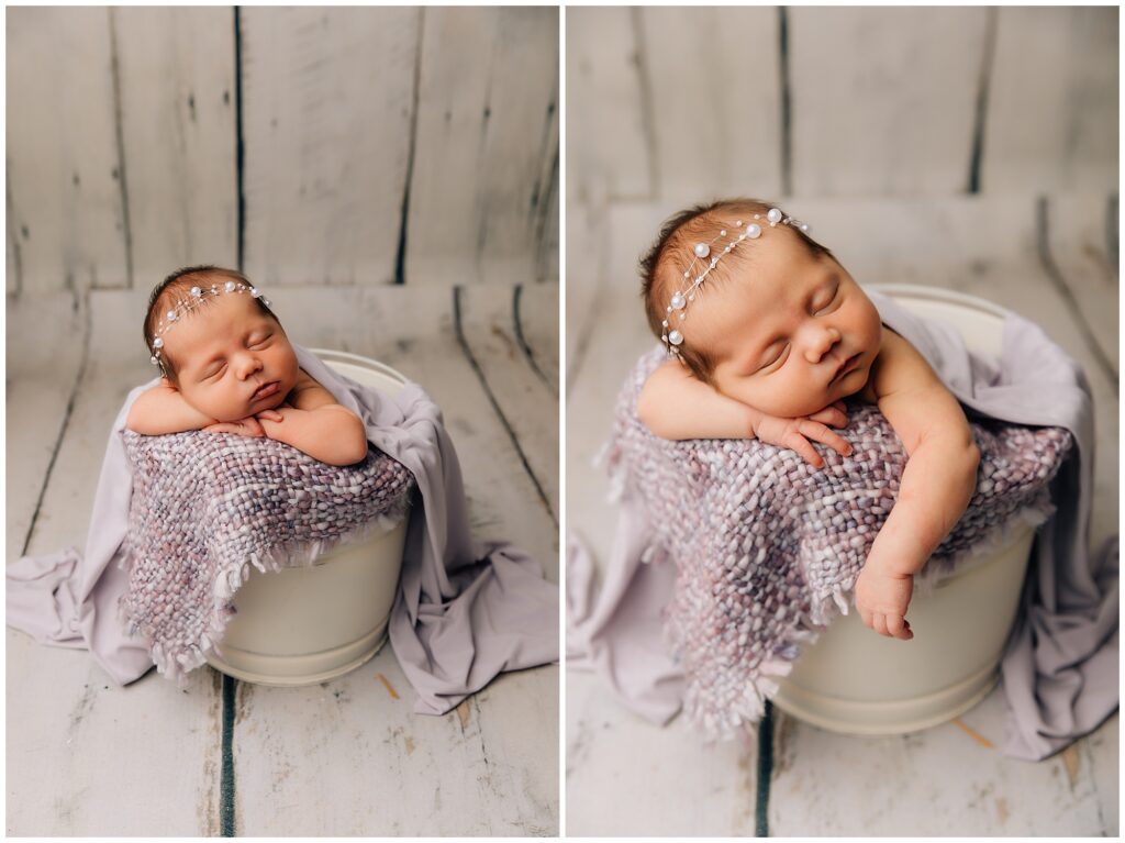 newborn girl in cream bucket with lavender accents